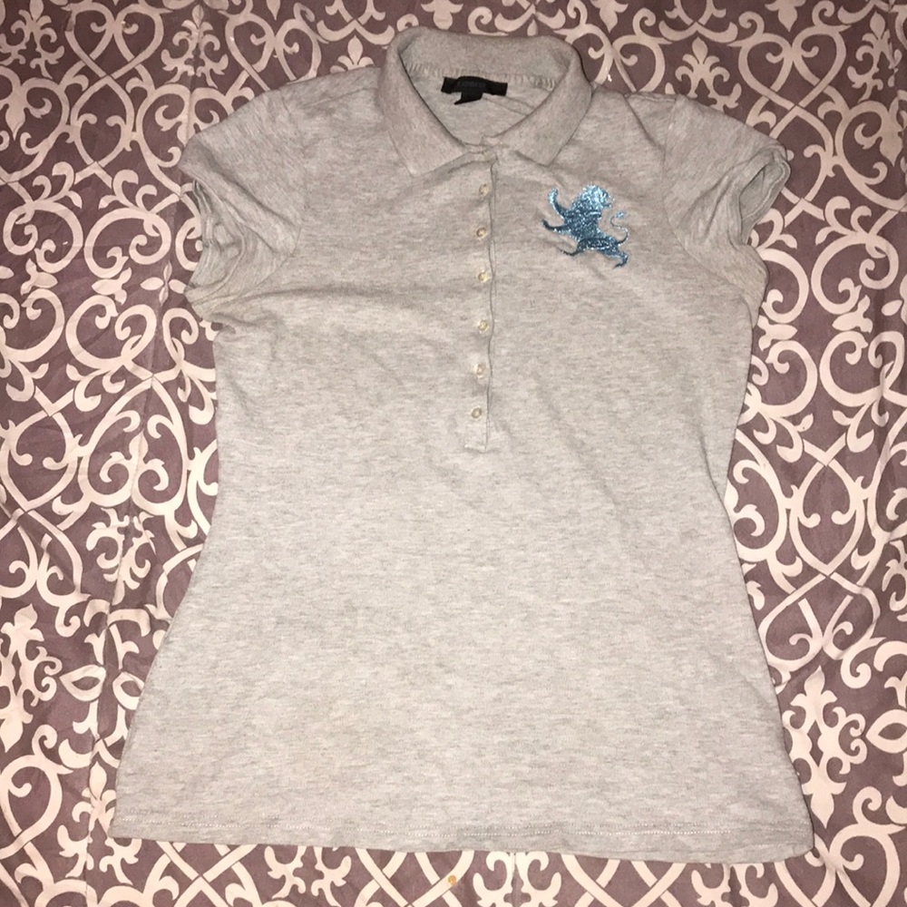 Grey polo shirt with dragon logo.